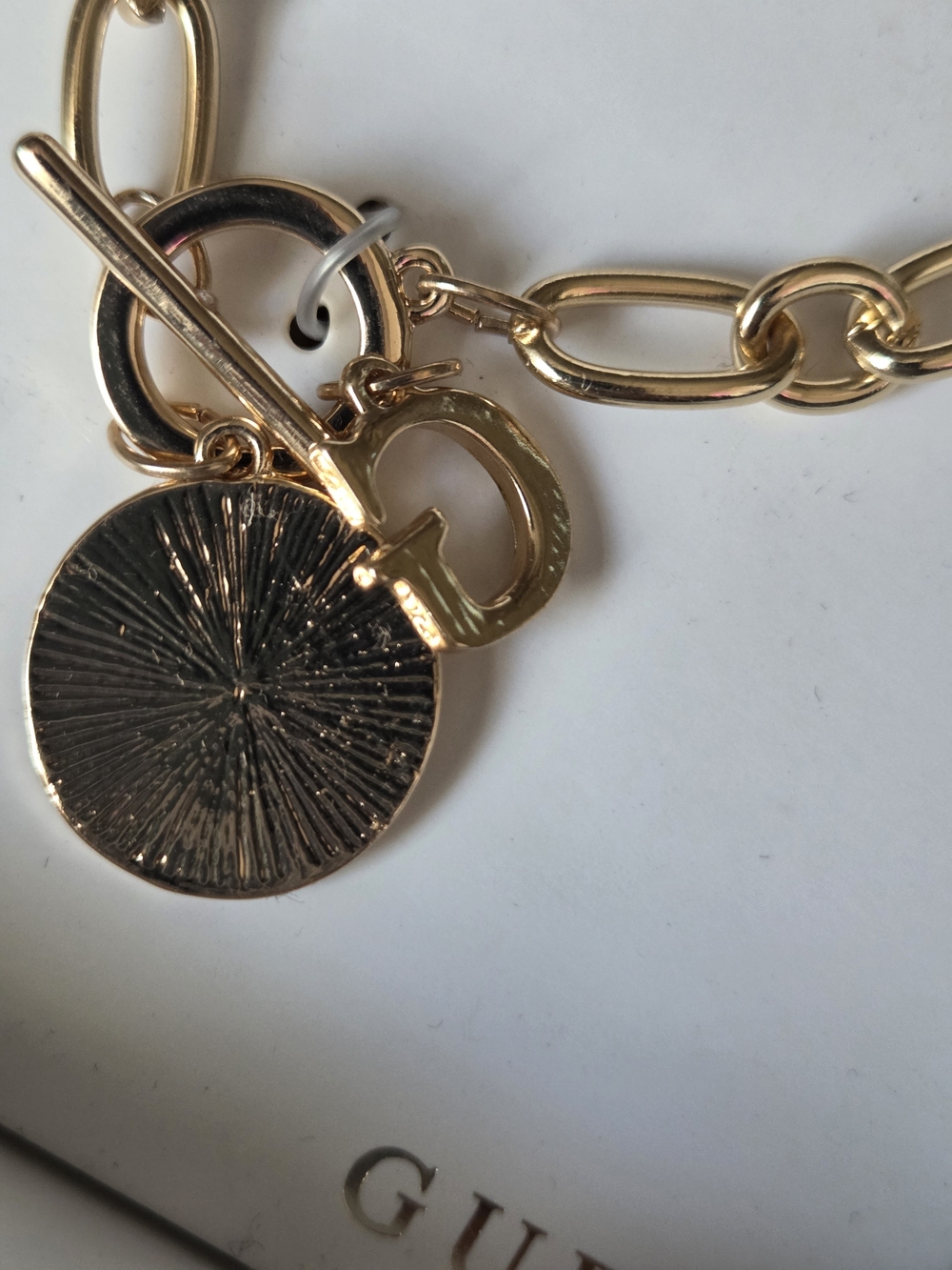 Guess Gold-Tone Chain Necklace with Crystal Heart Disc and G Charm - Picture 3 of 4